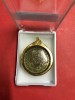 เหรียญทองแดงกะไหล่ทอง หลวงปู่ขาว อนาลโย วัดถํ้ากลองเพล อ.หัวตะพาน จ.อุดรธานี ปี16 เลี่ยมทองสวยงาม