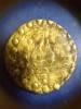 เหรียญทองคำเงินโบราณยุคสมัยทวารวดีขนาดเส้นผ่าศูนย์กลางประมาณ 1 เซ็นติเมตร (อายุมากกว่า 1,000 ปี )