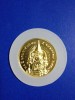 เหรียญระลึก 60 ปีบรมราชาภิเษก 5 พฤษภาคม 2553 เนื้อทองคำชนิดพ่นทราย  (จำนวนผลิต 7,080)